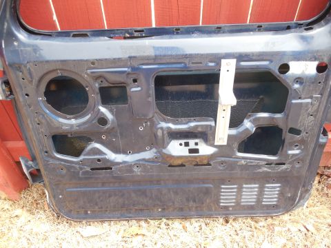 1983 Ford Bronco - Door inner skin '93EB has louvers near the bottom which are covered by its full door panel.