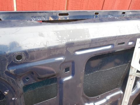 1983 Ford Bronco - Door outer skin date stamp '93EB : 6 22 A3 The hole at the Left of the pic (above & rear of the speaker well) is for the flag/paddle-style…