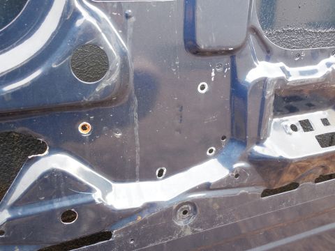 1983 Ford Bronco - Door inner skin date stamp '93EB : 6 23 7 The rough-edged slot and drilled hole near the bottom Left of the pic are to access the window mo…