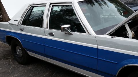 1991 Ford LTD Crown Victoria - This 1991 Ford Crown Victoria LTD features a distinctive two-tone blue and silver paint scheme.