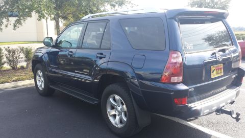 2005 Toyota 4Runner - This 2005 Toyota 4Runner is seen from the rear 3/4 angle, its dark blue exterior.