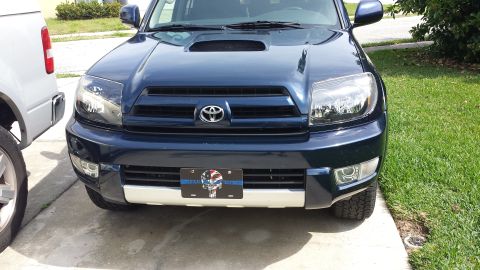 2005 Toyota 4Runner - This 2005 Toyota 4Runner features custom blacked-out headlights and a unique license plate.