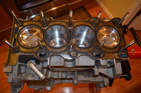 2007 Mazda 6 - Engine block with pistons installed, showing cylinder bores and gasket surface.