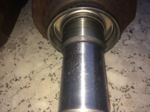 2011 Ford Elite - Close-up of a CV shaft and seal assembly, showing wear and rust.