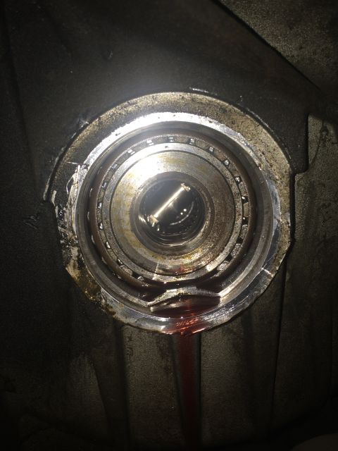 2011 Ford Elite - Damaged bearing showing signs of wear and a fluid leak.