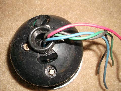 1971 Ford Ranchero - Close-up of a gauge cluster with various colored wires connected to the back.