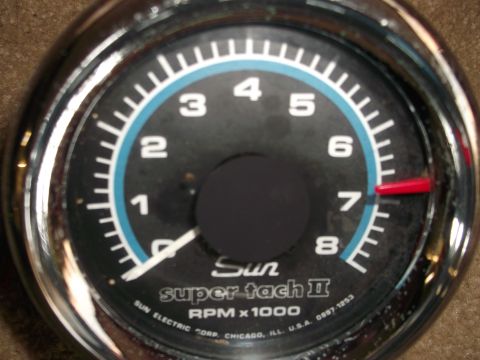 1971 Ford Ranchero - A close-up view of a Sun Super Tach II tachometer, indicating RPMs with a red needle.