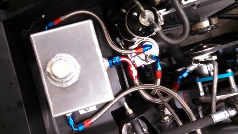 1967 Ford F-250 - Custom fuel system components, including a reservoir and braided lines, are visible in the engine compartment.