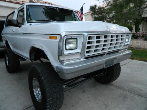 1979 Ford Bronco - This lifted Ford Bronco displays a distinctive grille and bumper, indicative of a 1978 model year.