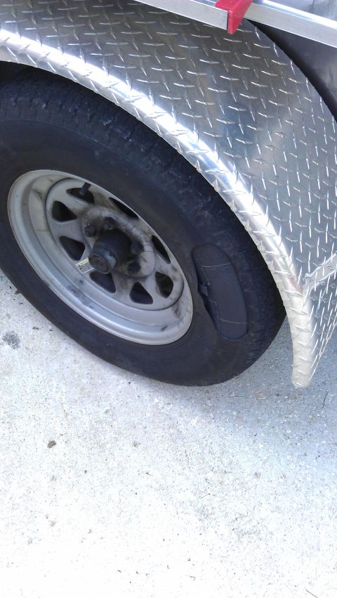 1994 Ford Bronco - Aftermath of Plan B. The bulge popped a mile or two after I noticed it but it's still holding air. When rotating the tire is noticably out…