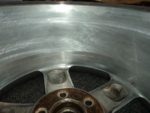 2004 Mercury Grand Marquis - Interior view of an aluminum wheel, showing the machining marks from its manufacturing process.