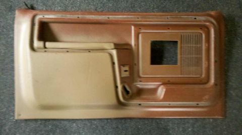 1982 Ford Bronco - Interior door panel from a Ford Bronco, likely from the 1980s.