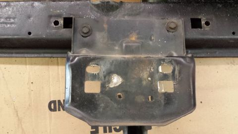 1978 Ford Bronco - This is a close-up view of a vehicle frame bracket, likely for a Ford Bronco.