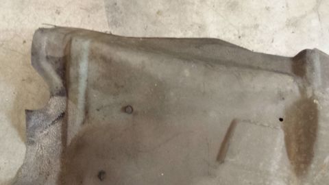 1978 Ford Bronco - Underside shield with visible mounting holes and a textured surface.