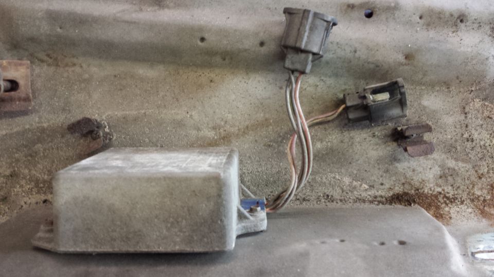 Close-up of an electrical module with two connectors and wiring