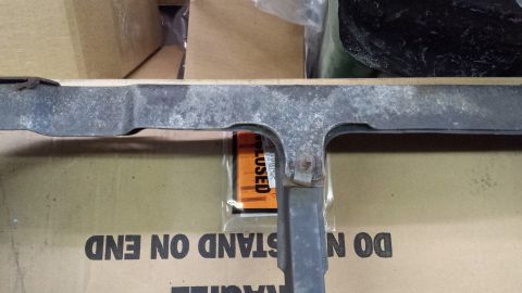1978 Ford Bronco - A metal part with a bracket is shown, with the Supermotors.net logo visible in the background.