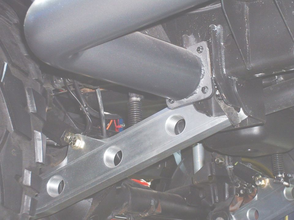Aluminum link bracket and tubular crossmember under a chassis