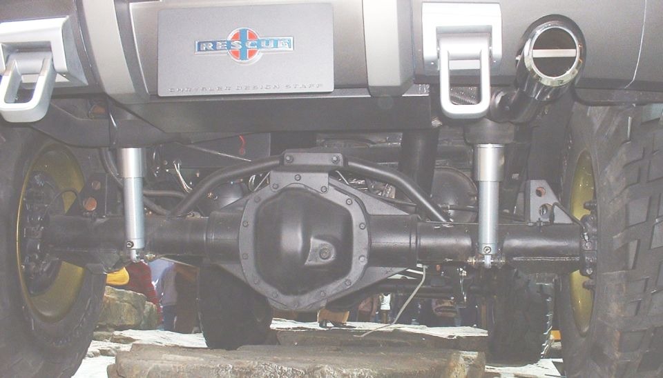 Rear axle and suspension under a vehicle with 'RESCUE' bumper plate