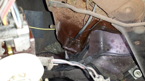 1978 Ford Bronco - Close-up view of engine bay components, showing rust and wiring.
