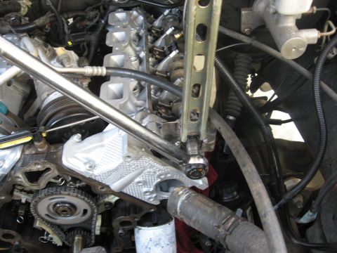 1994 Ford Bronco - Close-up view of an engine bay with mechanical components visible.