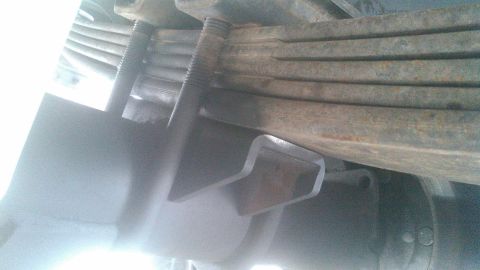 1996 Ford Bronco - got the axle swapped under it and made the axle so its got an equal amount of distance between the leafs and the rotors, put the wheels on,…