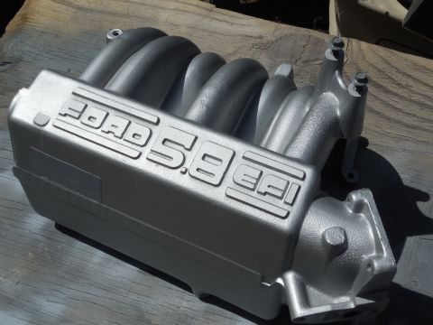 1993 Ford Bronco - After the DupliColor Aluminum Cast-Coat (DE1650), this is also getting planed on the text, and then engine clear (DE1636) to keep it that w…