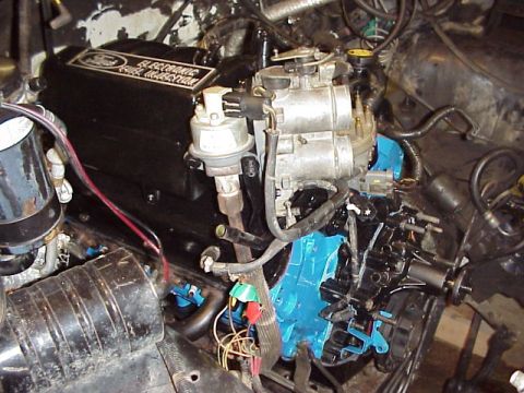 1989 Ford Bronco - Close-up of a Ford engine, likely from the late 1980s, showing the fuel injection system.