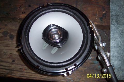 1990 Ford Bronco - A car speaker is shown being held by vise grips on a wooden surface. A date stamp reads 04/13/2015.