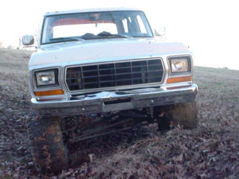 1979 Ford Bronco - This 1979 Ford Bronco is shown from the front, its distinctive grille and headlight design.