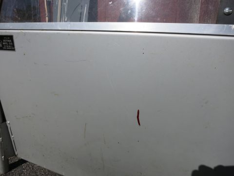 1991 Ford LTD Crown Victoria - A sticker is visible on the side of a vehicle door, showing manufacturer information.
