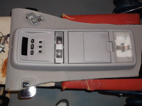 1999 Mercury Grand Marquis - Interior overhead console unit with various buttons and light fixtures.