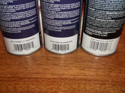 1999 Mercury Grand Marquis - Three spray paint cans display Ford paint codes for various graphite shades, including LT, M, and M DK.