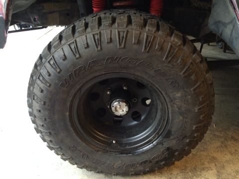 1978 Ford Bronco - This image shows a close-up of a tire and wheel assembly, not a complete vehicle.
