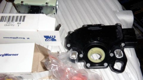 2001 Mercury Grand Marquis - A transmission range sensor is shown next to its packaging from BorgWarner.