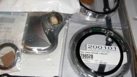 2001 Mercury Grand Marquis - Transmission parts kit includes a filter and roller clutch assembly, labeled for Ford AOD/E applications.