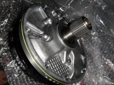 2001 Mercury Grand Marquis - Close-up of a transmission pump, showing the splined shaft and housing details.