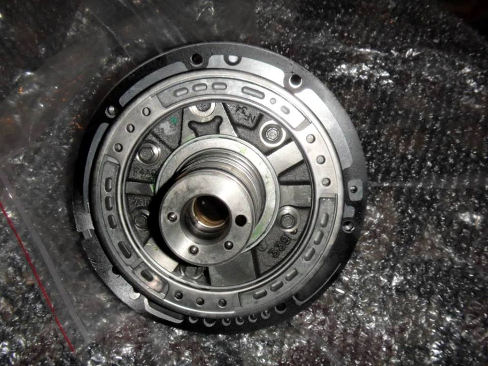 Transmission torque converter part with visible part numbers and internal components