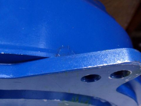 2001 Mercury Grand Marquis - Blue painted metal part with visible bolt holes and signs of wear.
