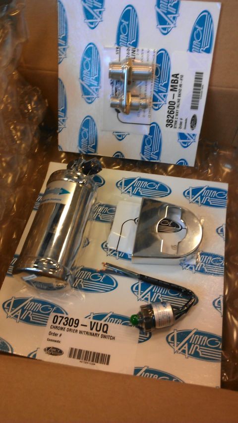 1964 Ford Fairlane - New Vintage Air parts including a chrome dryer and inline valve are shown in their packaging.