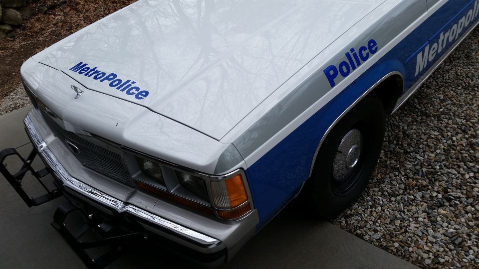 1991 Ford Crown Victoria LTD police car hood and fender with "MetroPolice" text