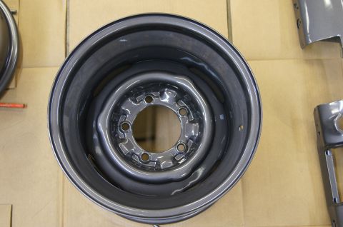 1979 Ford Bronco - A single steel wheel rim is shown, likely before tire installation or after refinishing.
