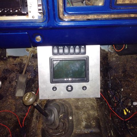 1978 Ford Bronco - Custom dashboard panel with switches and screen installed in a 1978 Ford Bronco interior.