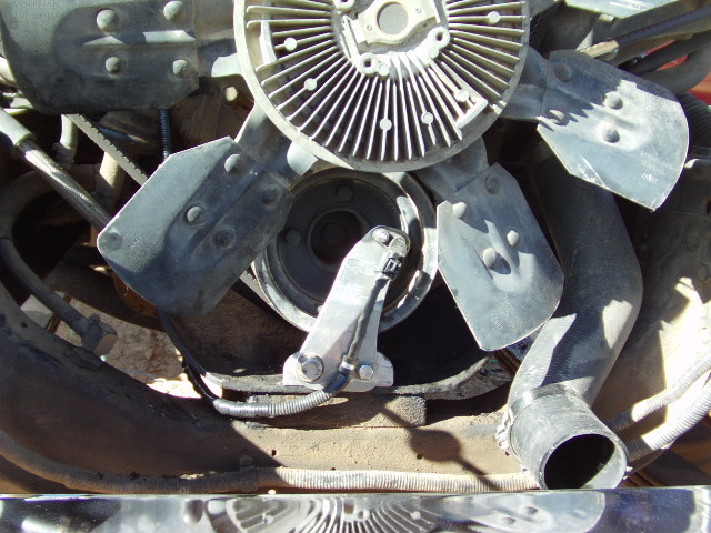 engine fan and shroud with hoses