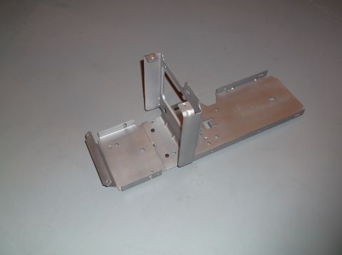 1999 Mercury Grand Marquis - A metal bracket is shown on a gray floor.