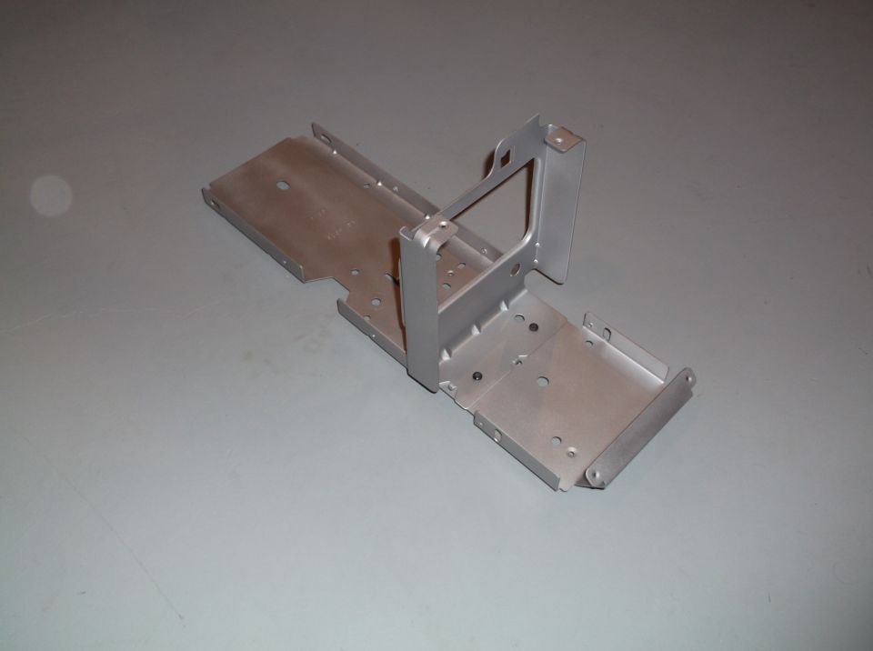 Metal bracket assembly with multiple mounting holes and support structures