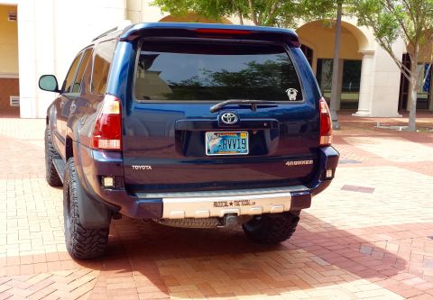2005 Toyota 4Runner - Blue 2005 Toyota 4Runner SUV parked outdoors, showing its rear end and license plate.