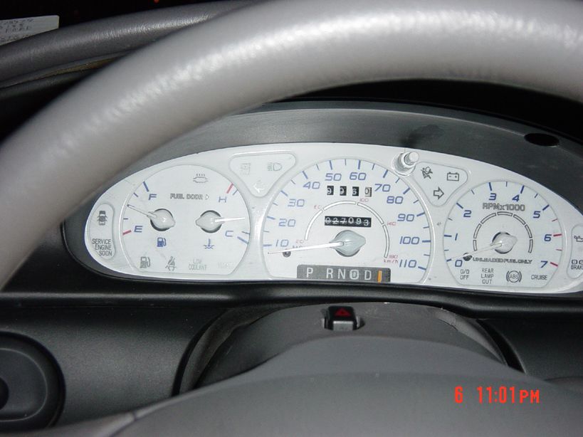 1996 Ford Taurus dashboard with odometer showing 93,093 miles and PRNDI gear selector