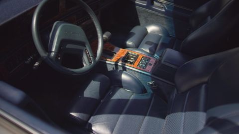 1995 Ford Taurus - Interior view of a car showing seats, dashboard, and center console details.