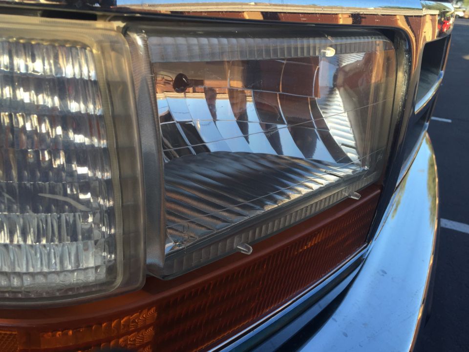1996 Ford Bronco headlight and orange turn signal