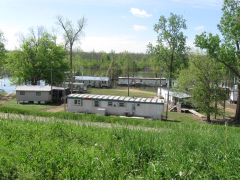 2006 Suzuki DR-Z400S - they had these trailers in the flood plains next to the river. not sure why, could have just put them on the other side of the levee
